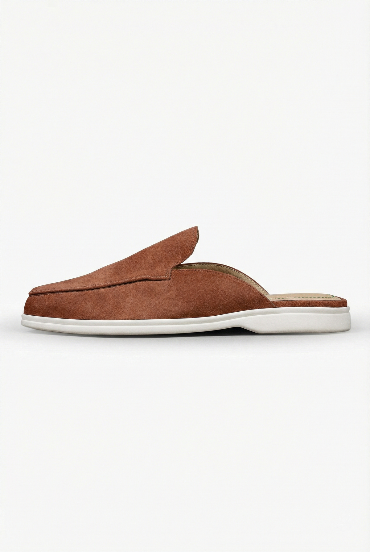 Mules in soft Italian suede by VLAD BYKOV Couturier House, Dubai.